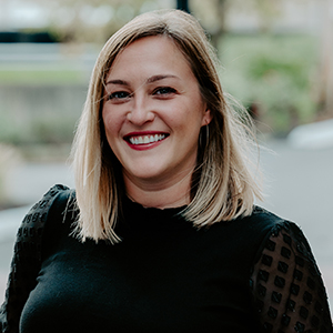 Susan Gosnell smiling headshot in a black blouse